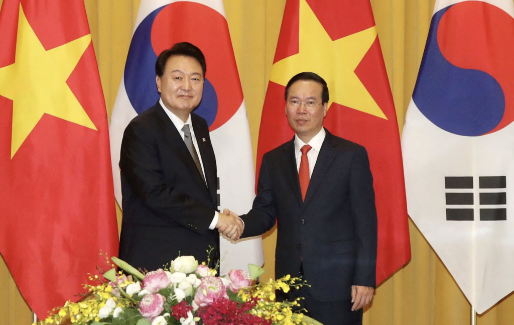 South Korea's President Yoon Suk Yeol shakes hands with Vietnam's President Vo Van Thuong during their meeting at the Presidential Palace in Hanoi, Vietnam, June 23, 2023. (Yonhap)
