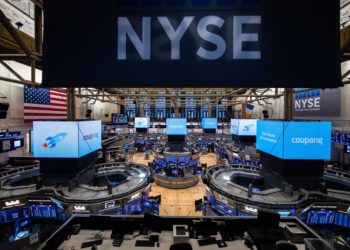 An electronic signboard on the floor of the New York Stock Exchange shows the logo of South Korean e-commerce giant Coupang Inc., which debuted on the U.S. bourse on March 11, 2021, in this photo released by Coupang. Coupang shares began trading at $63.5 per share, up 81 percent from an initial public offering price of US$35 each. (PHOTO:Yonhap)