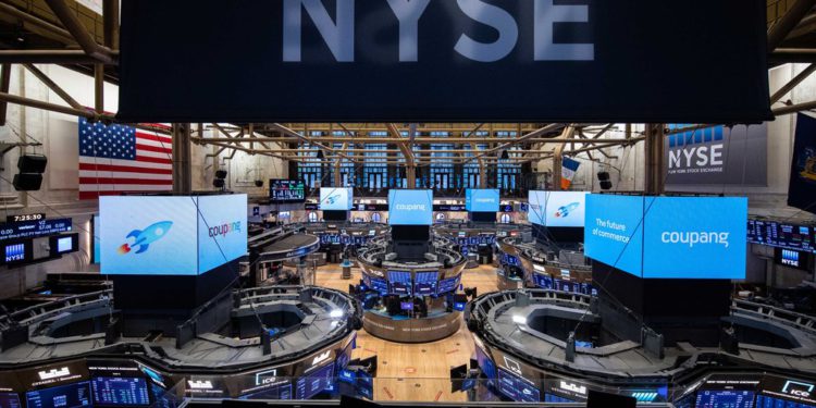 An electronic signboard on the floor of the New York Stock Exchange shows the logo of South Korean e-commerce giant Coupang Inc., which debuted on the U.S. bourse on March 11, 2021, in this photo released by Coupang. Coupang shares began trading at $63.5 per share, up 81 percent from an initial public offering price of US$35 each. (PHOTO:Yonhap)