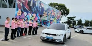 An electric vehicle, participating in the first Korea Peninsula Peace Road Electric Vehicle Drive, departs from Imjingak Pyeonghwa Nuri Park in Paju, Gyeonggi Province, on Monday. (IEVE)