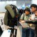 An official from Safeware introduces C3, a fall accident protection airbag, to visitors at the IFA Global Market. (Image courtesy: Safeware)
