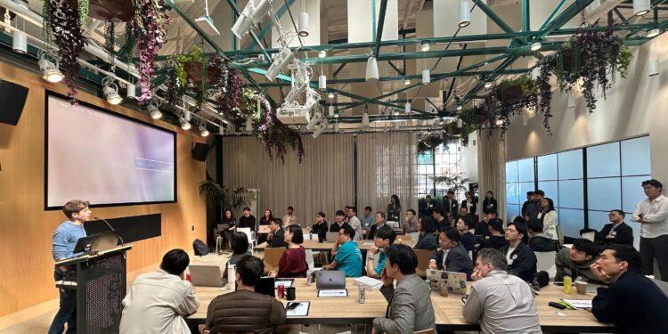 OpenAI CEO Sam Altman interacting with Korean startups at the OpenAI headquarters in San Francisco, /OpenAI